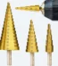 Top view of 3-piece titanium coated step drill bit set with clear size markings