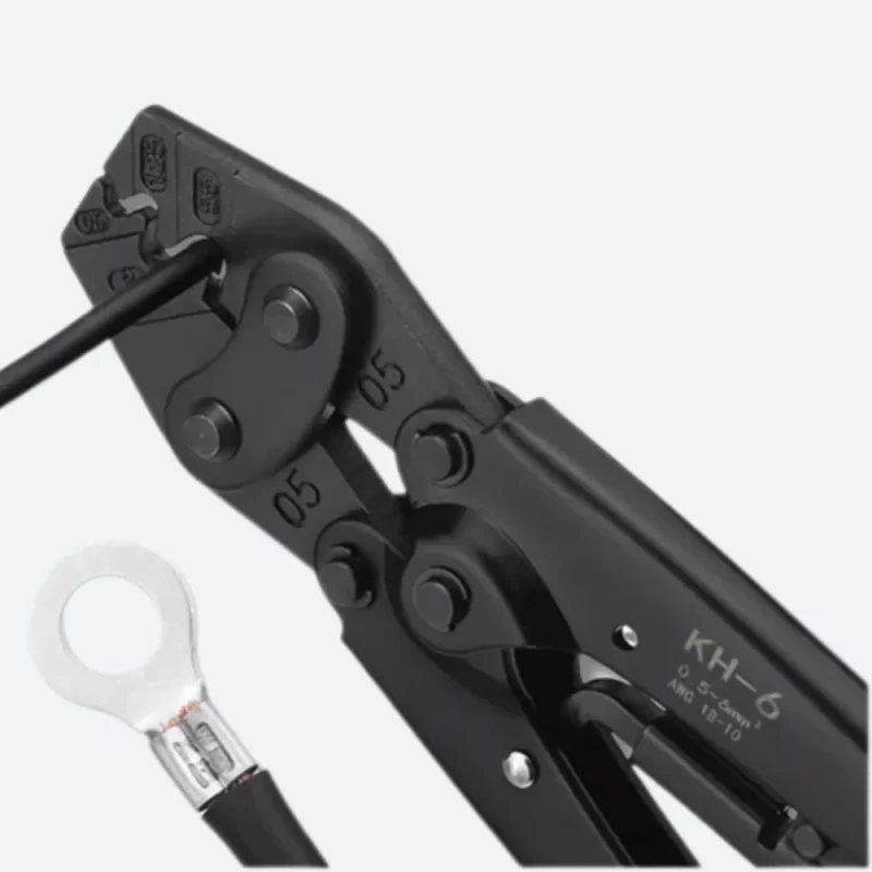 Close-up of YTH KH-6 crimper jaws clamping U-shaped copper lug terminal